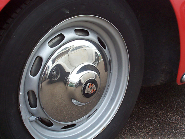 Reflected Beetle in Porsche wheels