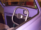 Square steering wheel and custom dashboard