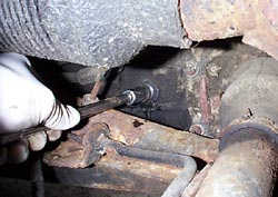 Removing gearbox oil filler bolt